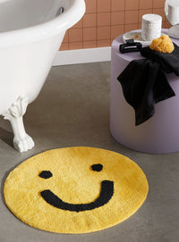 Smiley face bath mat