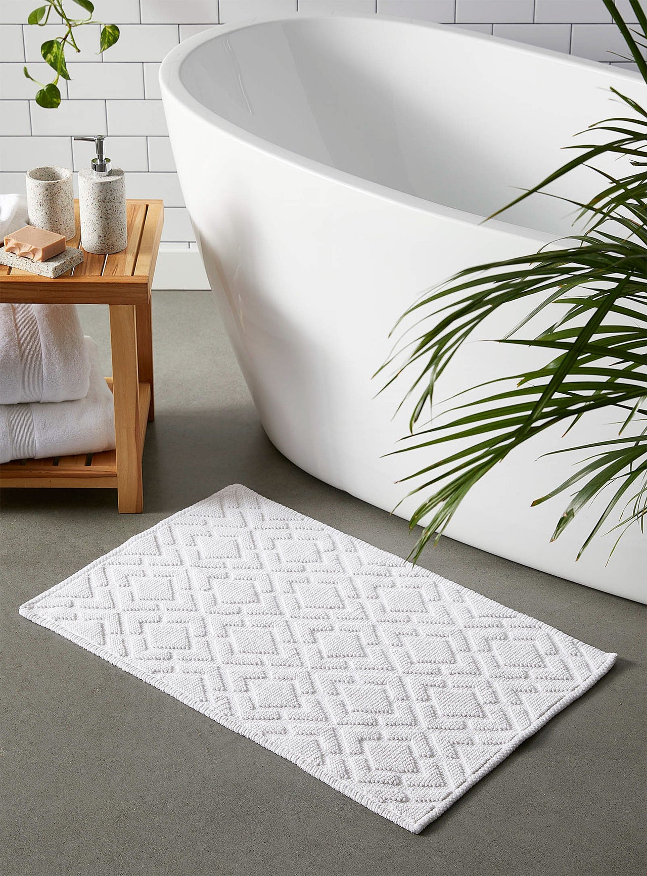 Embossed diamond bath mat