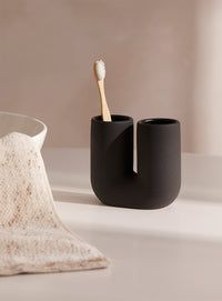 Thumbnail for Black cylindrical toothbrush holder